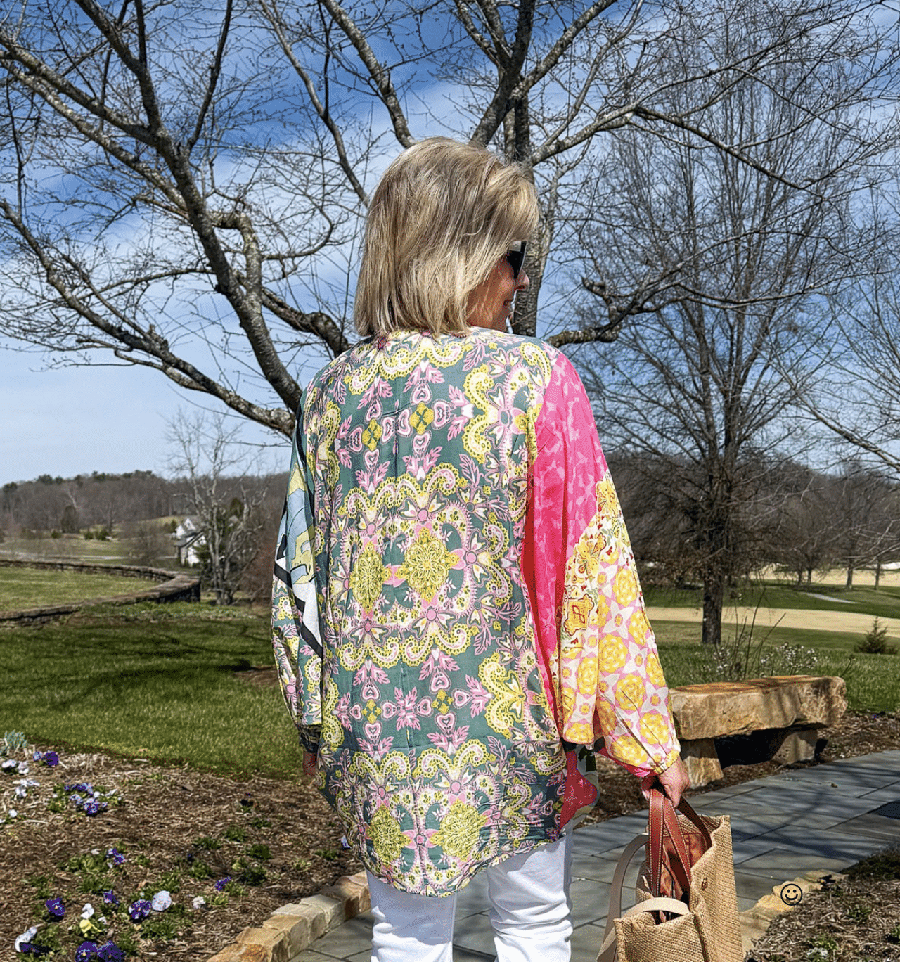 Tania Stephens wearing 2025 Spring styles of a back view of a colorful jacket from Nordstrom Rack